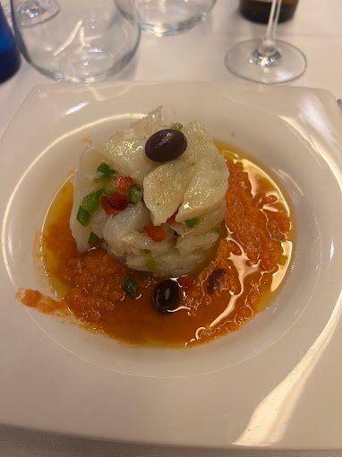 Amoca Linyola · plato de la carta